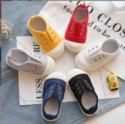 Children's canvas shoes boys and girls cookie shoes net red spring and autumn casual shoes children's shoes solid color elastic set feet student shoes