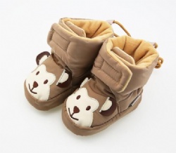 baby booties in light brown with puppy