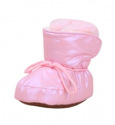 baby booties in solid shining pink