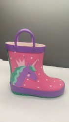 rubber rain boots in pink with unicorn